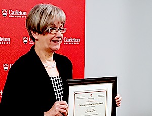 Janna holding certificate