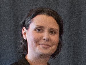 Julie looks at camera