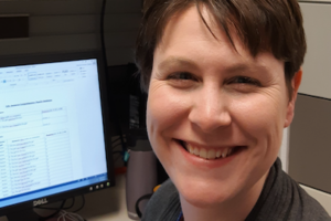 Tamara in front of her computer