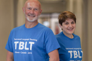 David and Eva wearing TBLT teeshirts.