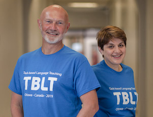 David and Eva wearing TBLT teeshirts.