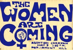 Yellow protest sign with the words "The women are coming, abortion caravan, may 9, 1:00pm, parliament hill" in blue letters