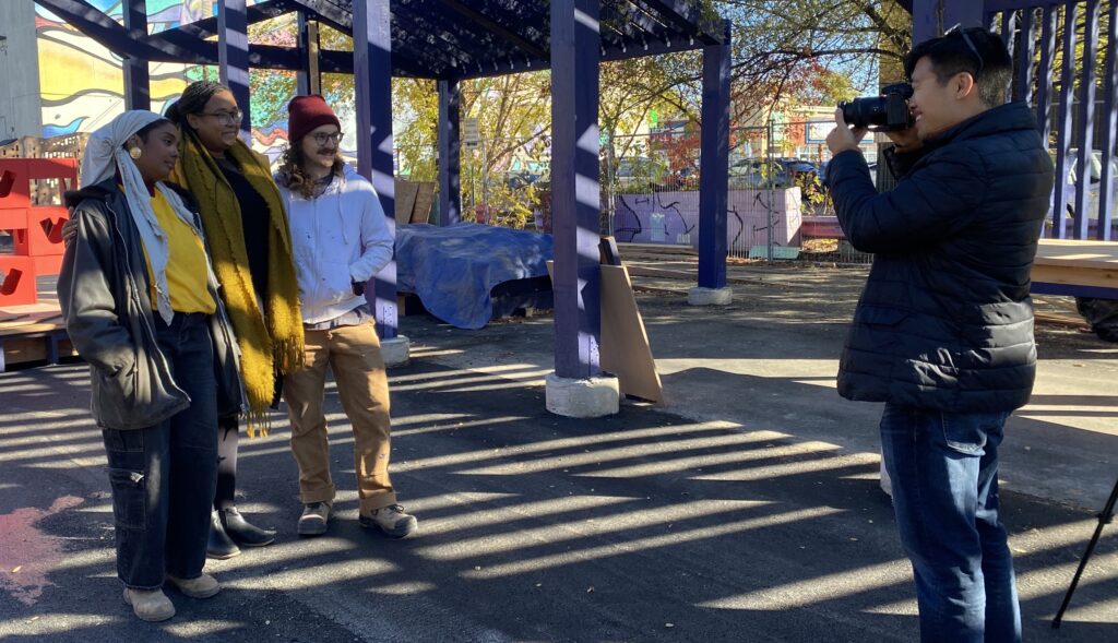 Behind the scenes of a cu film session. Staff are filming students on set of their research project.