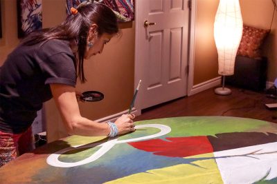 A photo of Claudia Salguero in her studio.