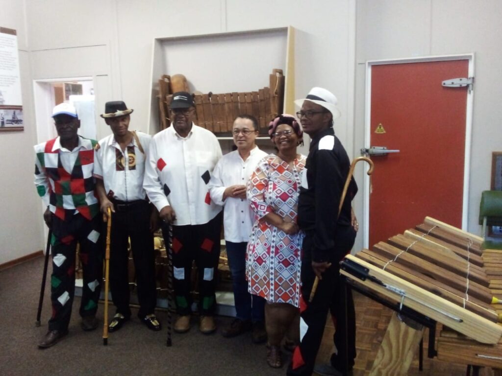 Image of Abraham Katimba, Wilard Veldskoen, James Mapanka, Lee Watkins, Sarah Titties, and Boetles Gewers standing together.