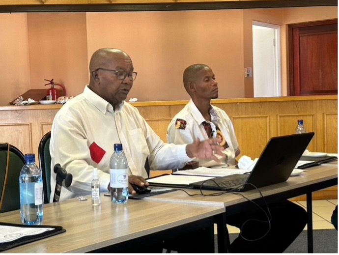 James Mapanka and Wilard Veldskoen sitting & speaking as part of the roundtable.