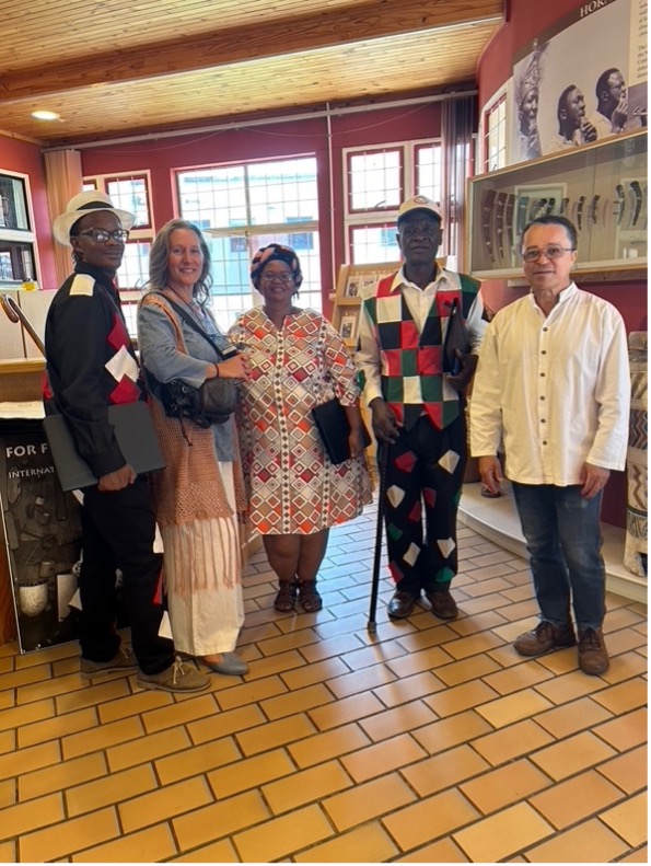 Image of Boetles Gewers, Merren Roy, Sarah Titties, Abraham Katimba, and Lee Wakins standing together.