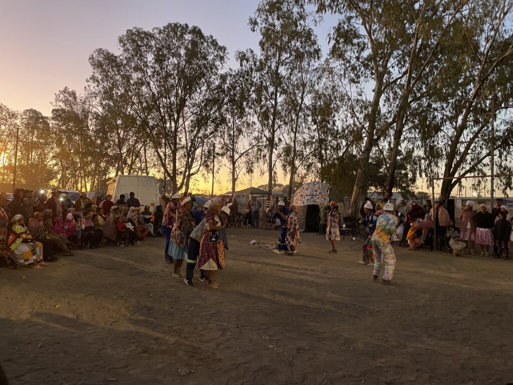 Festival goers performing Langarm and Namastap dances late into the evening.