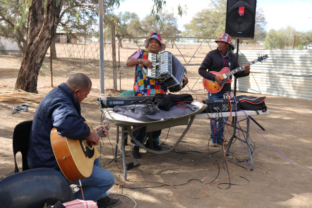 Gerald Stein (guitar), Frits Isaak (accordion), and Deon Swartbooi (electric guitar) performing Nama dances