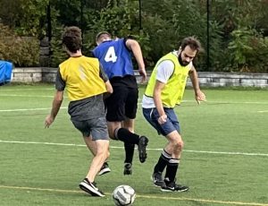Image of 2023 Stoney Cup: Player steals soccer ball from opposing team