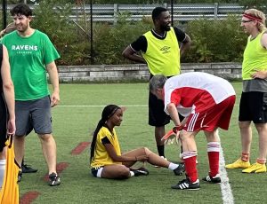 Image of 2023 Stoney Cup: Referee checks on a player for injury
