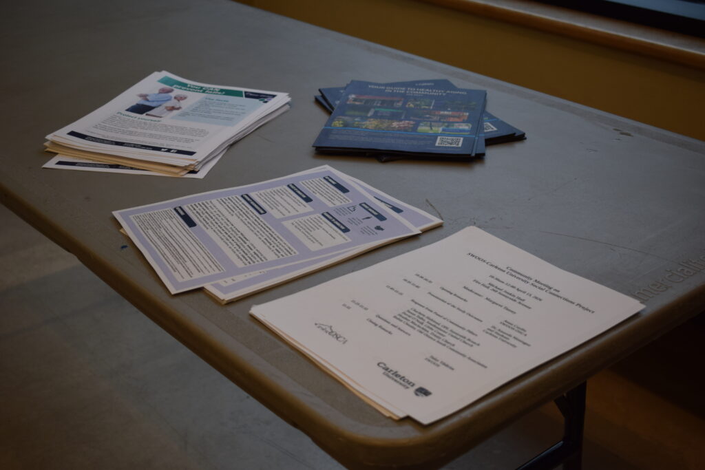 Table with informational handouts and flyers 