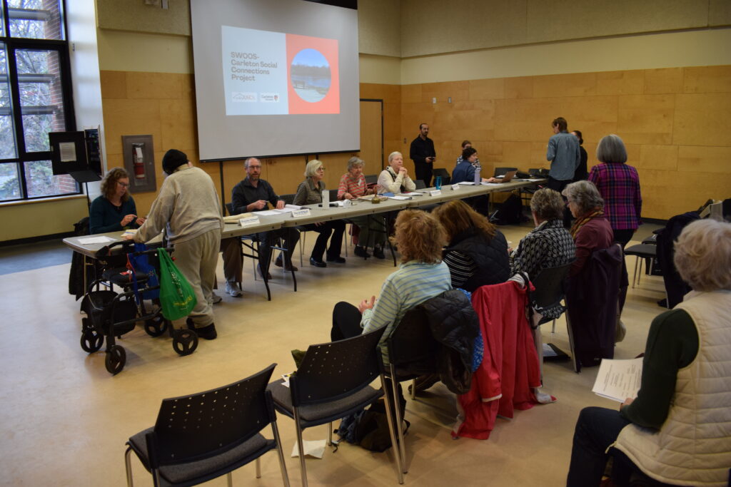 Panel presentation in front of an audience