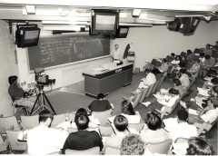 A black and white photo of a classroom