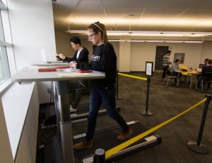 students using treadmill desk in discovery centre