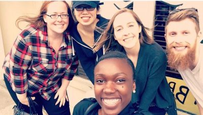 A group photo of the five students