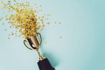 Award trophy with stars spilling out