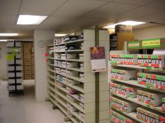 Rows of shelves filled with VHS tapes