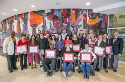The EDC's CUT graduates pose for a group shot holding their certificates