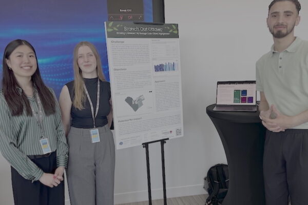 Three students stand beside their poster at CityStudio Ottawa HUBBUB 2026