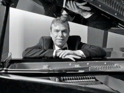 James McGowan sitting at a piano