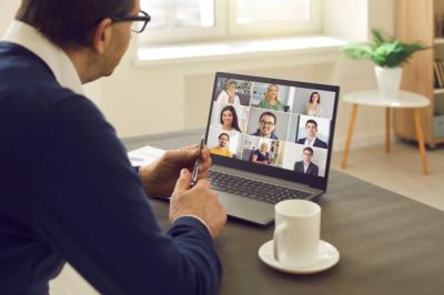 Image of man on zoom call.