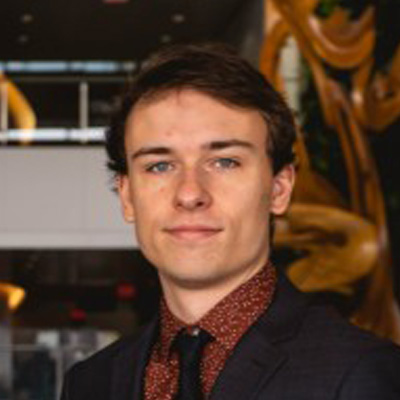 A photo of Alex Salojin, a graduate of the EURUS MA program at Carleton University