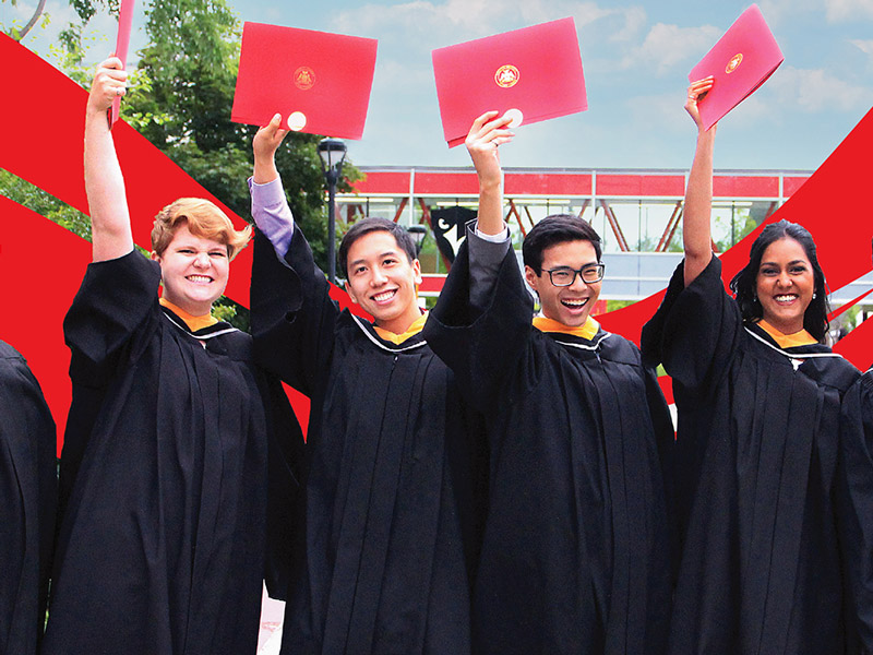 Carleton students hold up their cu_people_degree at Convocation