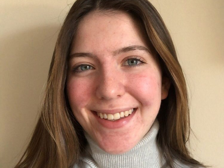 A headshot of Nadine.