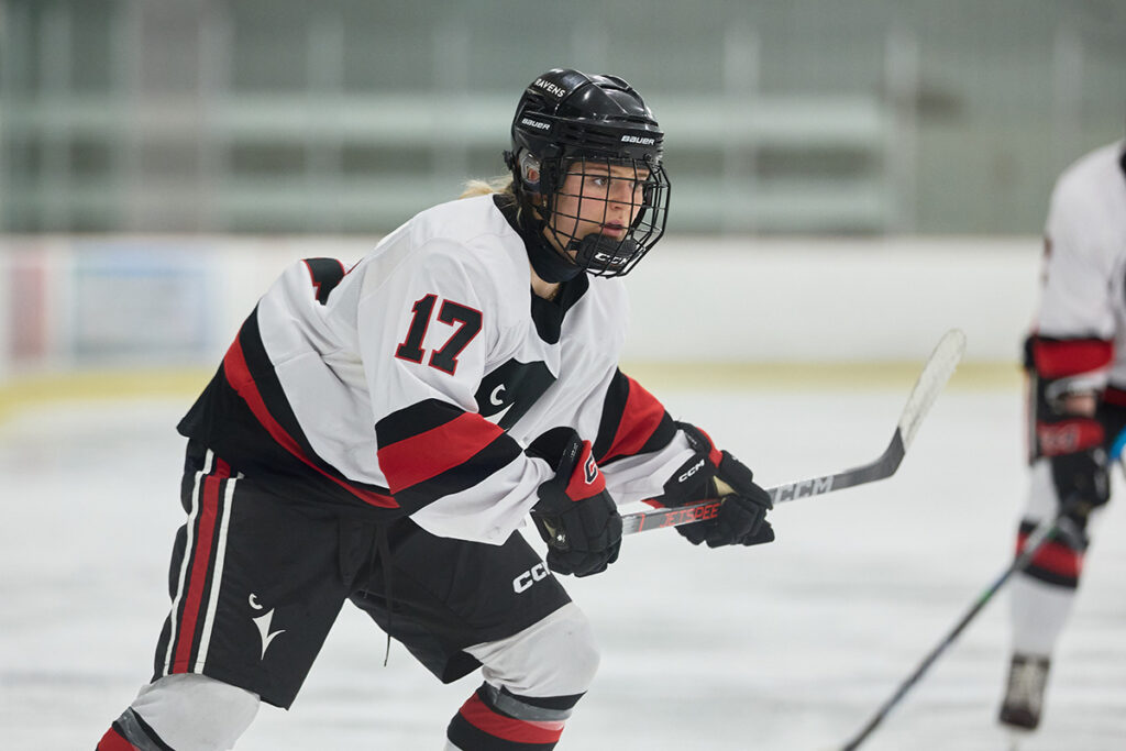 A side profile of a hockey player during a game.